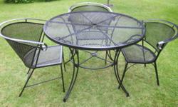 Black Wrought Iron Patio Table with
Three Chairs
Table is 42inch dia. x 29inch tall
Chairs are generous and very comfortable
$275.00
Umbrella and Stand available also for $100.00