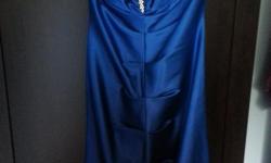Size Small
Beautiful blue strapless La Chateau dress.
Fits the body like a glove, with perfectly placed pleats in front and back.
Blue satin like material starts at the top as an elegant sapphire blue fading into a blue/black bottom.
Perfect piece for any