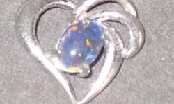 Very rare Blue Opals from Australia, never worn, looking to sell, catch the light beautifully, if interested please email me