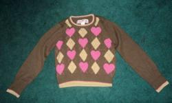 Girls brown gap sweater with brown diamonds and pink hearts and diamond outlines.  In excellent  condition, never worn, size XS (4-5), smoke free home
