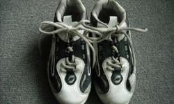 Pair of boy's size 5 "TRULY" brand running shoes. White,grey and blue man-made material. Good condition, no rips.