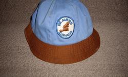 VERY GOOD CONDITION. light blue hat with a brown brim the front badge reads Beaver Canada