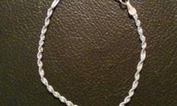 One white gold bracelet don't wear it anymore need it gone! asking $150 obo
This ad was posted with the Kijiji Classifieds app.