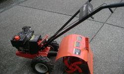 Ariens 4hp rear tine rototiller, brand new with manual, 18" tines, gas driver