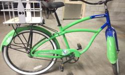 Brand New never used Norco Cruiser for sale. Branded Blue and Green with Steam Whistle (beer) logo. Tires flat, but otherwise in perfect order. Comes with attached rear basket.