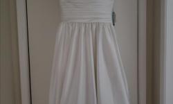 Ivory colour, size 6, length cut but not hemmed. Never worn