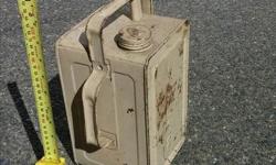 I gallon metal petrol container in good shape overall.