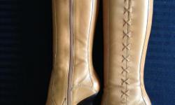 Stylish boot in tan coloured leather.
Pointy toe gives it a chic look.
3" heel and side zipper.
I paid $180 and never wore them!