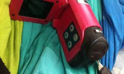 Pink camcorder takes aa battery's asking 15 text 1-604-239-5276