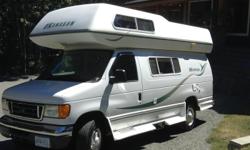 Okanagan campervan in great condition. -Microwave, Fridge, Toilet, Shower, 3 burner stove and oven, Propane furnace, Front AC, Smoke and carbon monoxide detector, Lots of cupboard and storage space. It sleeps 4 with Queen bed on top and smaller bed