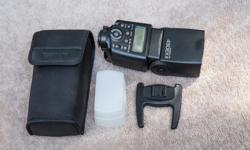 The canon 430 EX II is Canon's best mid-sized flash... I can shoot all day with it without trading out batteries. It recycles silently and almost immediately, even when I boost the power. I have 2 of them so am selling one.
With Box, pouch and mini-stand