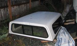 Canopy for Ford pickup. Was on a 1994 F250 full size box. Glossy white paint tinted windows. Sliders on side and front. Dual locks on back door. In great shape. Like new.