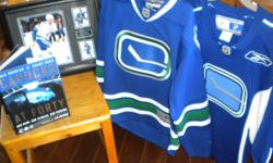 Just in time for the new hockey season! We have two jerseys, one Adult M and one S, both like new. Also, a framed collection of Henrik Sedin pics, and the book Canucks at 40. Jerseys are $60 each, photo is $40, and the book is $20. Or buy the whole