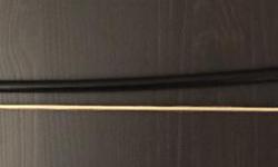 Carbon fibre bass bow in excellent condition. All of light weight and elegant in design, the bow delivers excellent torsional strength and smooth power transfer into the strings creating a beautiful bowed double bass tone. Included, is the custom hard
