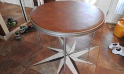 Excellent condition.
Round padded card table.
Folds.