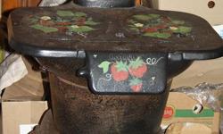 Tole painted cast iron stove, $75 and a strong guy to lift it !!