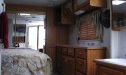 CEDAR CREEK RLBS30 5TH WHEEL NO PETS OR SMOKE  2 SLIDES, QUEEN BED, WALL TO WALL CLOSET, LARGE DRESSER, WALK IN SHOWER, COUCH OPEN TO BED, SIDES OPEN FOR FOOT REST, 2- LEATHER CHAIRS, TABLE-4-CHAIRS, NEW HD-TV  CEILING FAN, NEW 10-PLY BFG TIRES, TINTED