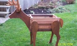 Unique cedar moose and deer planters for the garden enthusiast just in time for Christmas!    They are approx. 40" high x 36'' long.    Perfect for a flower pot in the summer or decorating a corner in the yard or cottage.