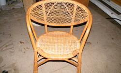 Ratan chair is in great shape $25, solid side table $25