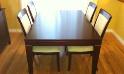 Solid Cherry Wood Table + 6 chairs & China Cabinet. Table extends at both ends.