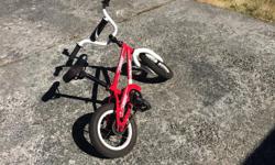 Child's bicycle with 12" wheels in excellent condition.