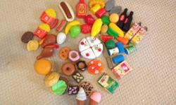 Great little set of food and condiments toy set for kids. Makes me hungry just looking at it! Fun and educational! Our kids loved it! Includes burgers, fries, various deserts including donuts! Hot dogs, ketchup, sardines, cake, etc. YUM!
Our little girls