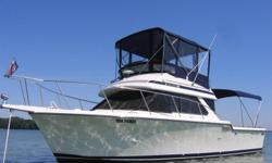 Delivered new by Gregory Marine in Detroit and berthed at the Windsor Yacht Club since new.
Fly Bridge seats 5 comfortably.
- 34 ft overall with 11 ft. 9 in. beam.
- upper and lower dual command stations
- twin 350 cu. in. closed cooling system Crusader