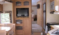 Citation Supreme RLS 29.5 Fifth Wheel Polar Pak Four Season.  We are selling our top quality Canadian made Citation that is in next to new condition.  It has a living room and bedroom slide and options such as Vacuflo, Electric baseboard heat and Electric