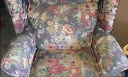 Classic BARKA armchair that reclines, in lovely floral pattern. A little worn on right side of upper "wing" but otherwise in great condition. Arm and head covers.