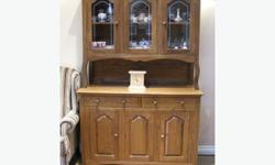 Get ready for hosting your guests for Thanksgiving and Christmas dinners!
Quality buffet and hutch; made of solid oak; excellent condition. Two drawers and two doors in buffet; two doors in hutch. Hutch can be separated from buffet for moving.
Delivery