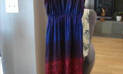 Beautiful colors in this silk dress. Has slits on side of legs, and an open back with a tie. Elastic waist. Size 0. In excellent condition. Can arrange drop-off in Victoria.