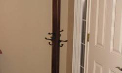 Cedar coat tree with 8 black cast iron hooks (4 at the top, 4 in the middle).  Made by owner.  Or can build one to suit.