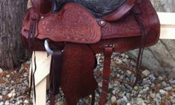 Vintage 15" Red Ranger saddle. Fully tooled, all leather. About 40 yrs old, in excellent condition with no marks or scratches. Very well looked after. Has 7" gullet, solid horn & tree. Well made saddle. Has #918 on back. All original except fleece has