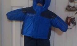 Boys 12 month Columbia snowsuit
 
Boys Columbia snowsuit will keep your little one nice and warm. The jacket is in excellent condition and looks brand new (no rips or stains). The jacket is also reversible and the snow pants are a bib style which is nice