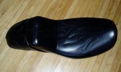 This is a cool flame stiched Corbin Gentry Motorcycle Seat for a Harley Davidson Shovelhead that should fit models between 1958-1984.  It is in excellent shape with no condition issues, other than one rub mark on the underside where it meets the bike.