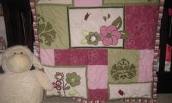 I have a 6 pcs. CoCalo bedding set for a crib in excellent condition. We paid $330.00 for it.
Includes:
Mobile, window valance, fitted crib sheet, bumper pads, dust ruffle, and quilt.