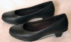 For sale is a pair of black work heels, designed for comfort and well-cushioned. $20
