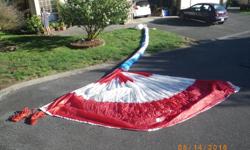 Red and White Nylon Cruising Spinnaker with sock and sheets.In perfect condition, used only three times. Sold the boat.
0.75 nylon, I=37.5, J=11.25, 645 sqft (60 sqm)
