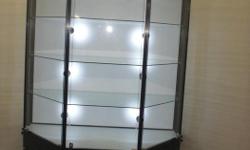 High end custom made, store display cabinets with built in lights. I have 10 cabinets varying in sizes, including Cash register counter. I paid over $26K for all so looking to get something reasonably close! Must sell ASAP make me an offer! I can sell