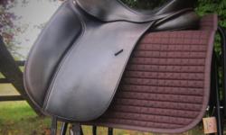 Custom Regal Dressage Saddle!
This buttery soft, custom made 18" Regal dressage saddle is stunning. This beautiful saddle is shaped with a medium gullet, spacious channel, and a narrow twist. Cut back to allow lots of movement in the shoulders. This