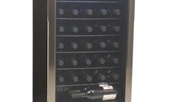 Danby 35 Bottle Wine Fridge bought in 2012.
Temperature cooling range 6Â°C to 14Â°C
Shatter resistant tempered glass door with platinum trim
6-full width shelves and 1 staggered shelf
Automatic defrost
Reversible door hinge
Dimensions: 17-1/2 W x 18-1/2 D x