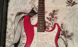 Red Dean electric guitar
Hard case
guitar strap