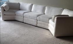 White sectional; custom designed originally purchased from Norwalk Interiors for $6000. Excellent condition and very comfortable. 12 ft by 4.5ft.