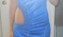 Stretch silk fabric. Can be worn size S-M. Retail value of $80. Fitted. Embellished.