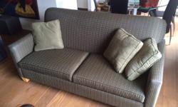 Designer high quality sofa in excellent condition. 72 in. long and 34 inches deep.