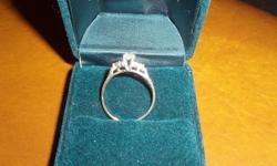 I have a lovely diamond engagement ring appraised September 8, 2011 at $1,670.00 replacement value. Purchased at People's Jewelers and appraised at Graham's Jewelers in Courtenay, BC. The centre diamond in the engagement is 0.20 ct. There are a total of 7