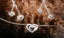 White gold diamond heart pendant with chain and earrings set. Paid 899.00$