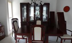 Solid wood, cheery finish. Table, 2 leaves, 6 chairs , Hutch ( 2 shelves) and Buffet ( one drawer / 3 cupboards) . 2 chairs are captains chairs. Table 64.5 inches x 42 inches. Leaves are 12 inches each so expands to 88.5 inches x 42 inches.
Comes with 3