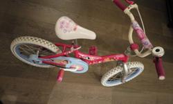 Pink Punch color with Disney Princess design
Easy to reach spinning handlebar bell
Decorated and fully enclosed chainguard
Bright white tires with shiny blue rims
Easy to adjust seat height with alloy quick release seat