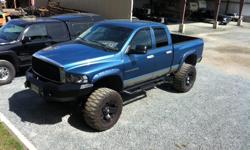 Make
Dodge
Year
2003
Colour
Blue
Trans
Manual
Has had allot of recent work done runs and drives great.
Southbend doul disc clutch 5kms ago
5inch stainless exhaust in March
5 new 20x12 rockstars
Edge with allitude on pillar
Bd intake elbow
Afe cold air